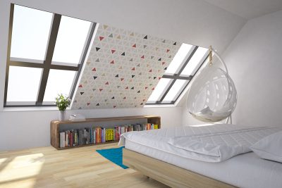 kolorowe trójkąty rozmieszczone na jasnym tle – tapeta dla dzieci